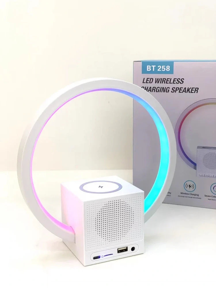 White Smart Ambience Light Bluetooth Speaker Wireless Charger unit showing wireless charging area, speaker components, and ambient lighting