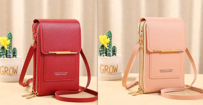 Women's messenger touch screen phone bag in solid colors with diamond decorative elements