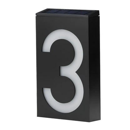 Solar powered house number with LED illumination showing waterproof construction and concealed mounting