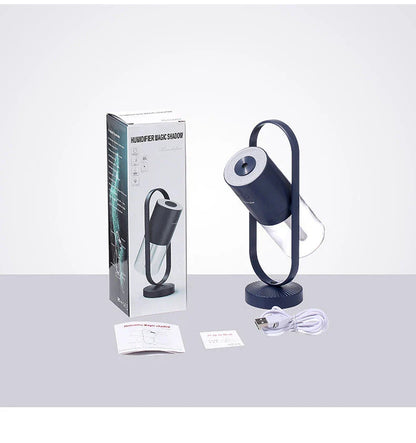 Compact desktop humidifier with starry projection feature, designed to improve air moisture and create a relaxing ambiance.