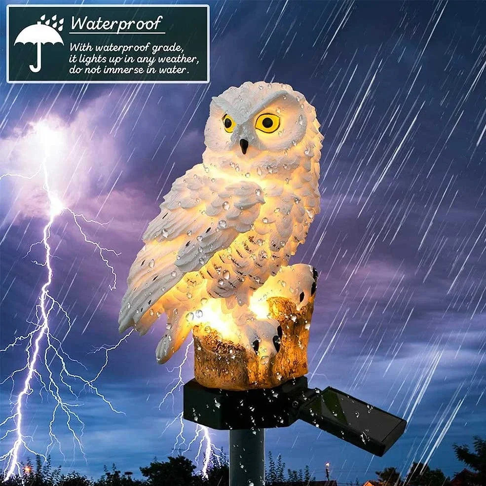 Solar owl garden light with realistic design standing 45cm tall, featuring LED illumination and solar panel