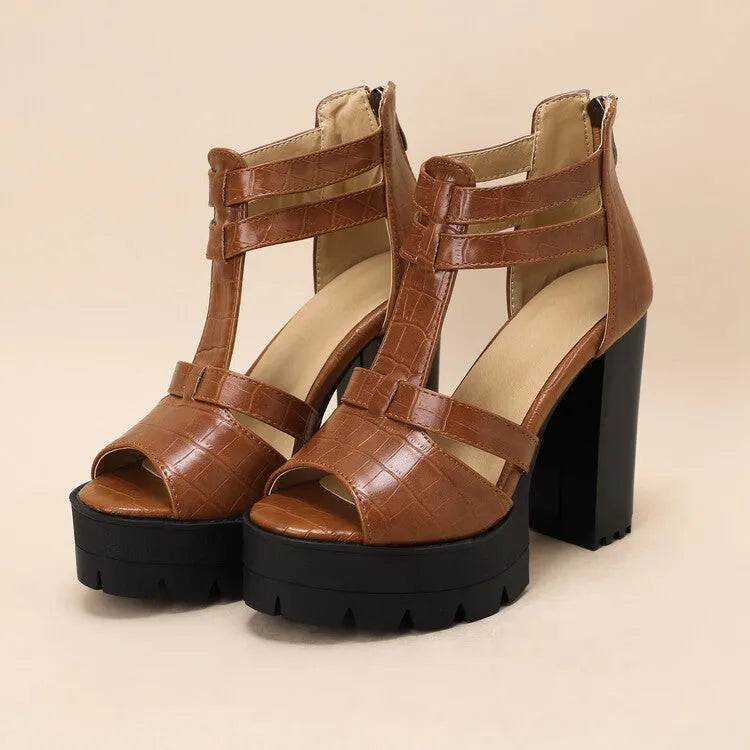 Women's black platform high heel sandals with a back zipper and round toe on a rubber sole.