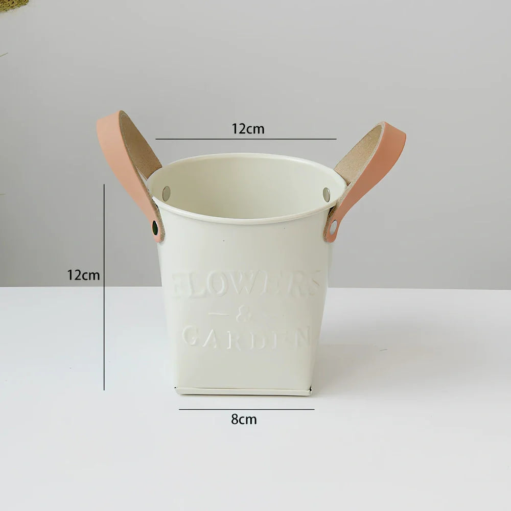 Iron flower pot with manual finishing in 15cm and 10cm sizes for desktop plants
