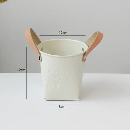 Iron flower pot with manual finishing in 15cm and 10cm sizes for desktop plants