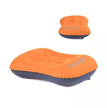 Compact inflatable travel pillow in peacock blue, bright orange, or green for camping and outdoor use