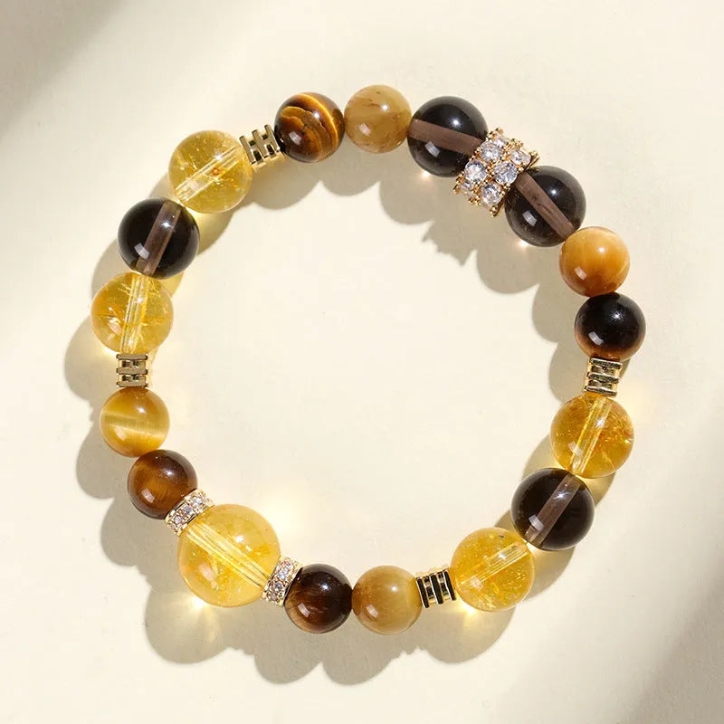 Close-up of a natural yellow 10mm artificial crystal bead bracelet for unisex wear.