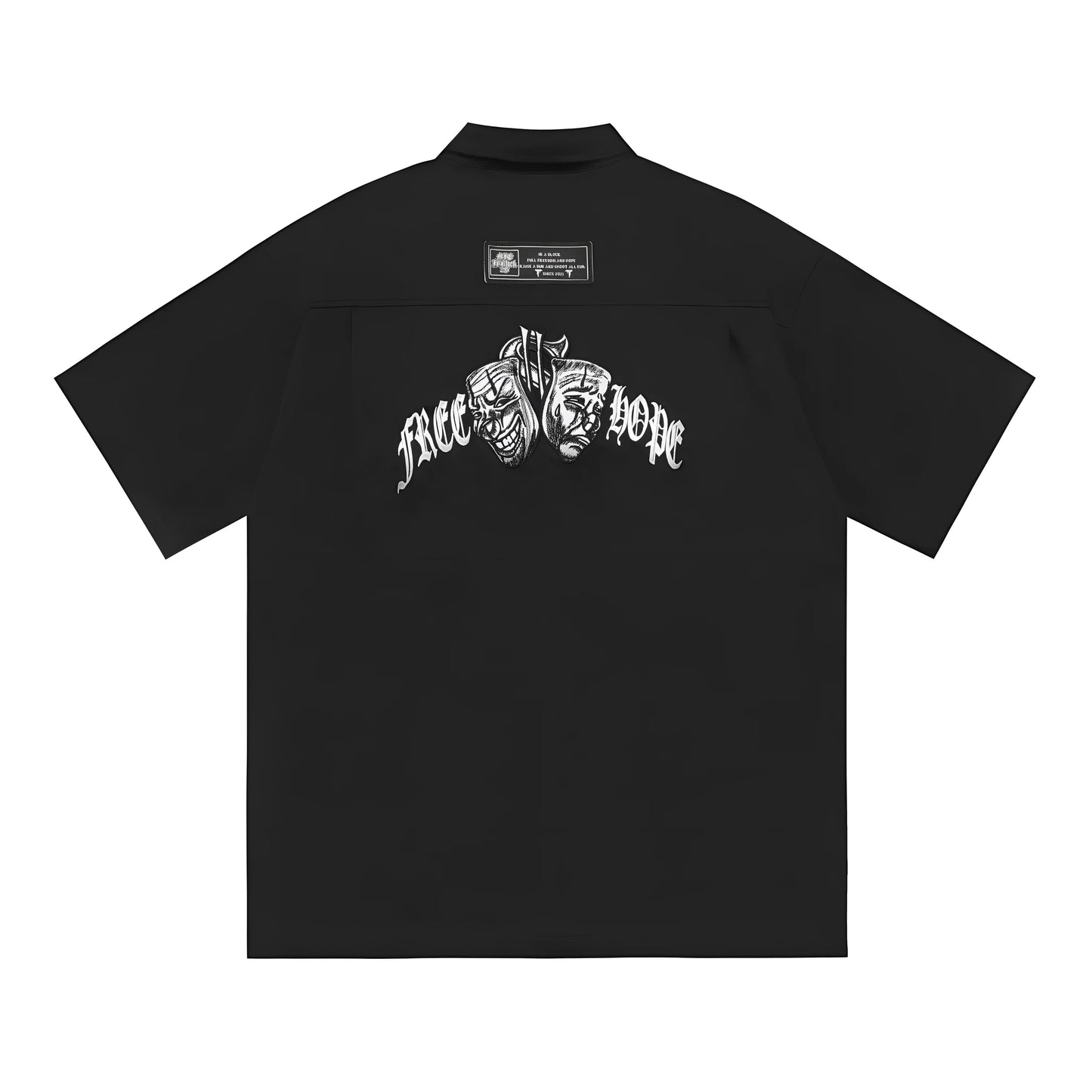 Man wearing a black cotton blend half-sleeve loose fit work shirt with embroidered detail.