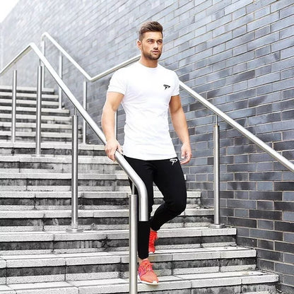 Men's quick-dry sports t-shirt in white, red, and black for fitness workouts