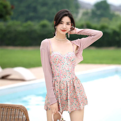 Women's floral jumpsuit swimsuit with adjustable suspender straps in pink or green colour options