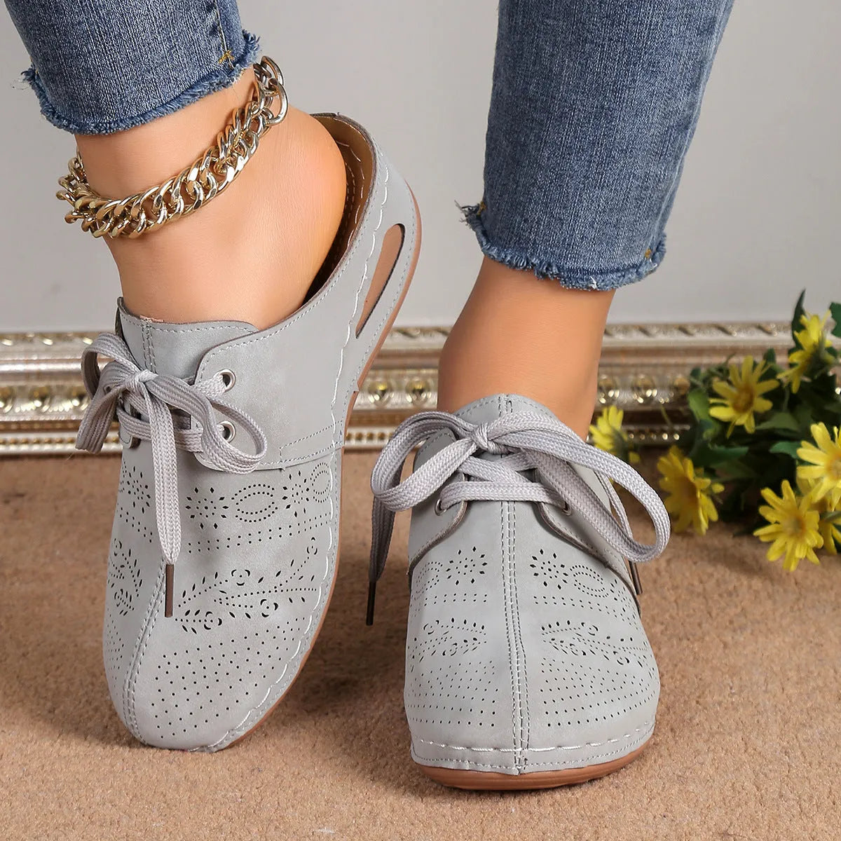 Women's summer lace-up slippers with hollow-out wedge design in black, suede upper, and rubber sole