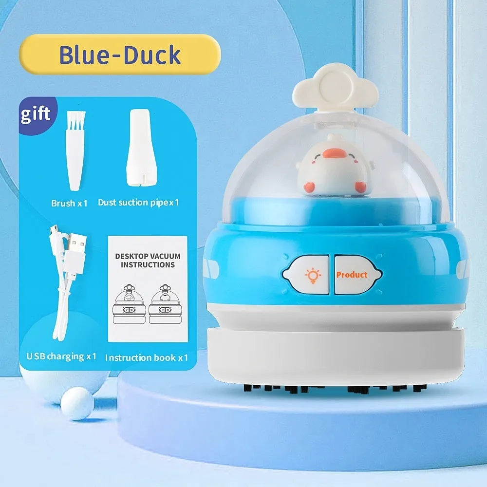 USB-powered handheld desktop vacuum cleaner in blue colour cleaning computer keyboard