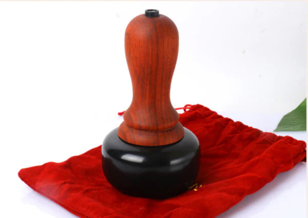 Bian Stone Warming Moxibustion Apparatus with red rosewood construction and natural bian stone for targeted heat therapy and traditional Chinese healing