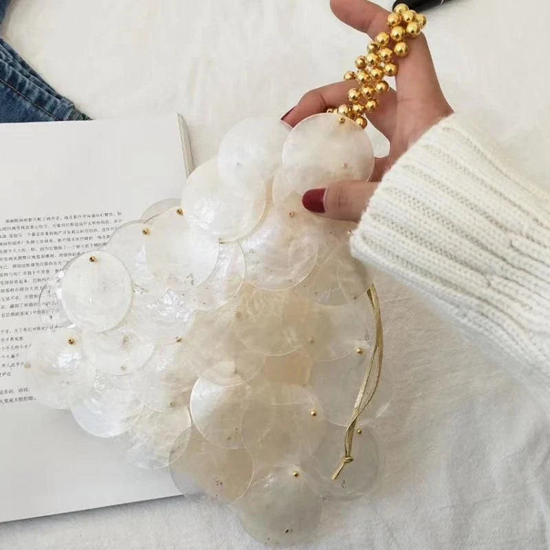 Luxury Sequin Evening Shell Bag with a unique shell shape and sparkling sequin decoration