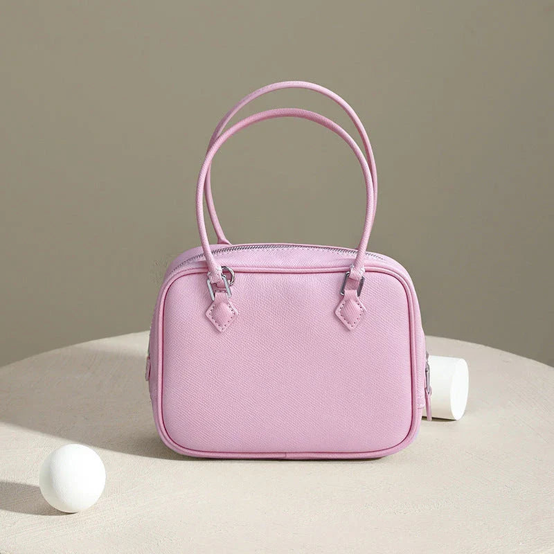 Leather Mini Shoulder Bag in Pink, featuring a compact square shape and crossbody design for versatile everyday use