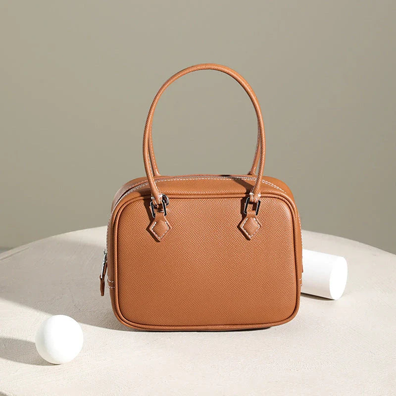 Leather Mini Shoulder Bag in Pink, featuring a compact square shape and crossbody design for versatile everyday use