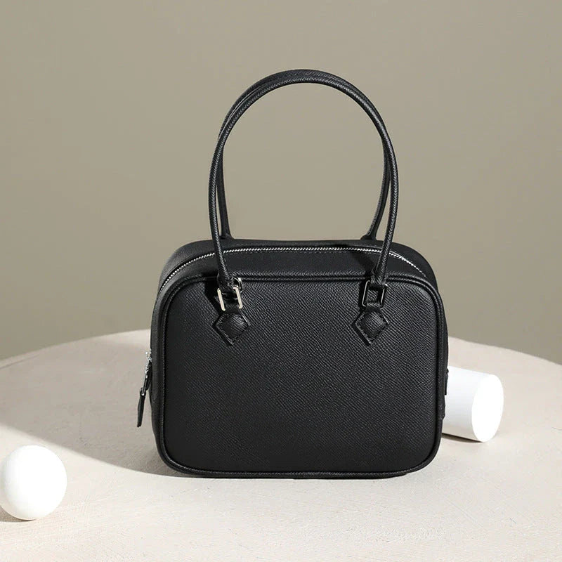 Leather Mini Shoulder Bag in Pink, featuring a compact square shape and crossbody design for versatile everyday use