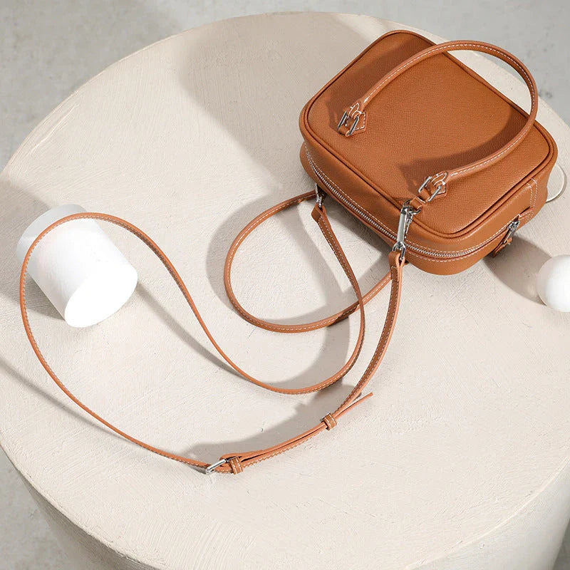 Leather Mini Shoulder Bag in Pink, featuring a compact square shape and crossbody design for versatile everyday use