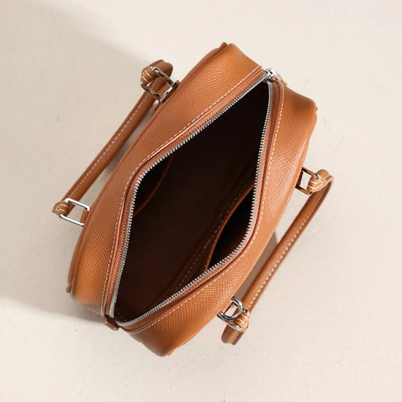 Leather Mini Shoulder Bag in Pink, featuring a compact square shape and crossbody design for versatile everyday use