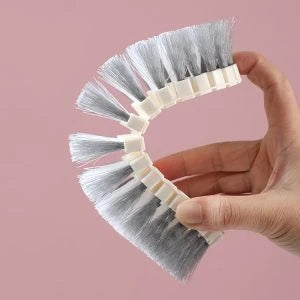 A versatile bathroom tile cleaning brush with a flexible design and durable materials for effortless scrubbing of tiles, grout, and other surfaces.