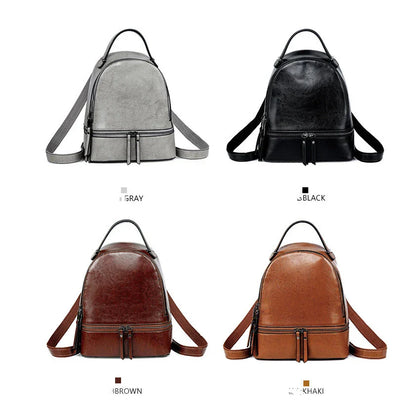 Fashionable leather backpack with cowhide material, multiple pockets, and stylish design elements