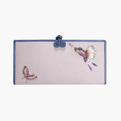 Elegant hand-embroidered long wallet in various colors, featuring a sleek buckle design and ample storage space