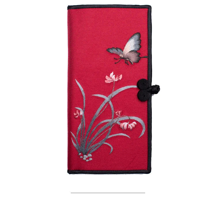 Elegant hand-embroidered long wallet in various colors, featuring a sleek buckle design and ample storage space