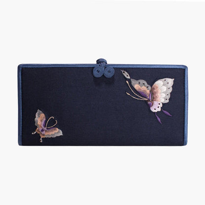 Elegant hand-embroidered long wallet in various colors, featuring a sleek buckle design and ample storage space