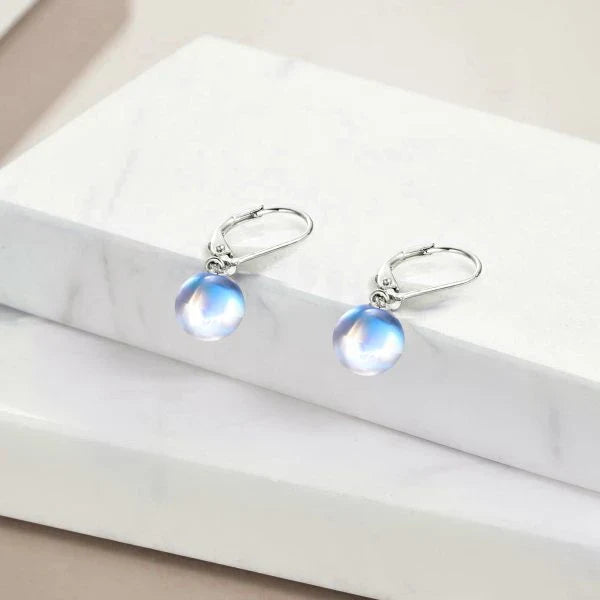 Elegant 925 sterling silver earrings featuring genuine moonstone drops for a timeless and enchanting look