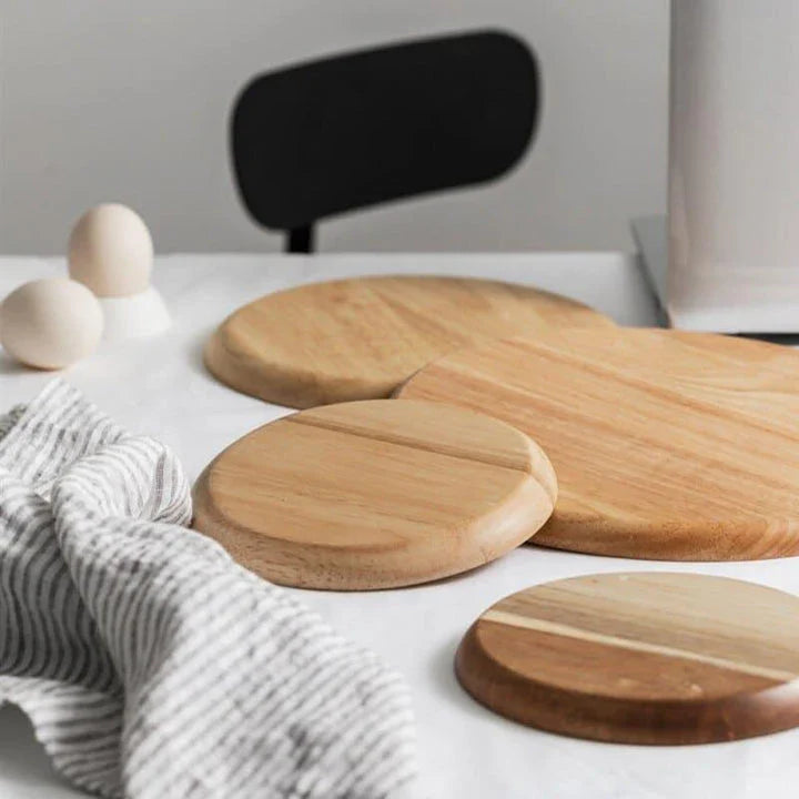 A natural wooden round tray with a sleek, versatile design that complements any home decor.