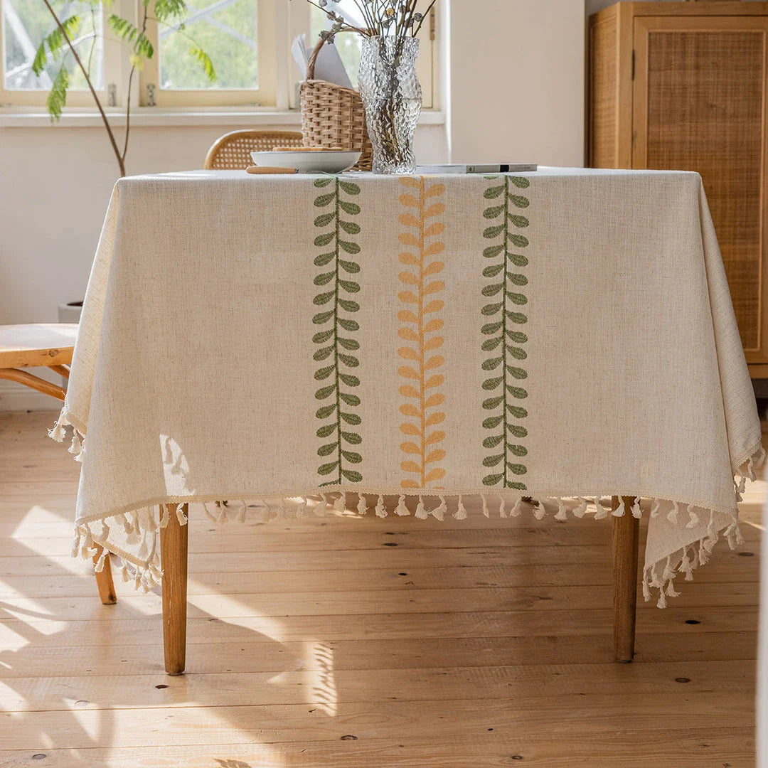 Elegant floral embroidery tablecloth in rectangular shape, featuring a delicate leaves pattern and durable polyester construction