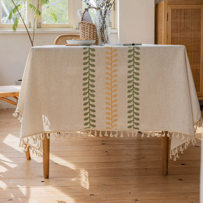 Elegant floral embroidery tablecloth in rectangular shape, featuring a delicate leaves pattern and durable polyester construction