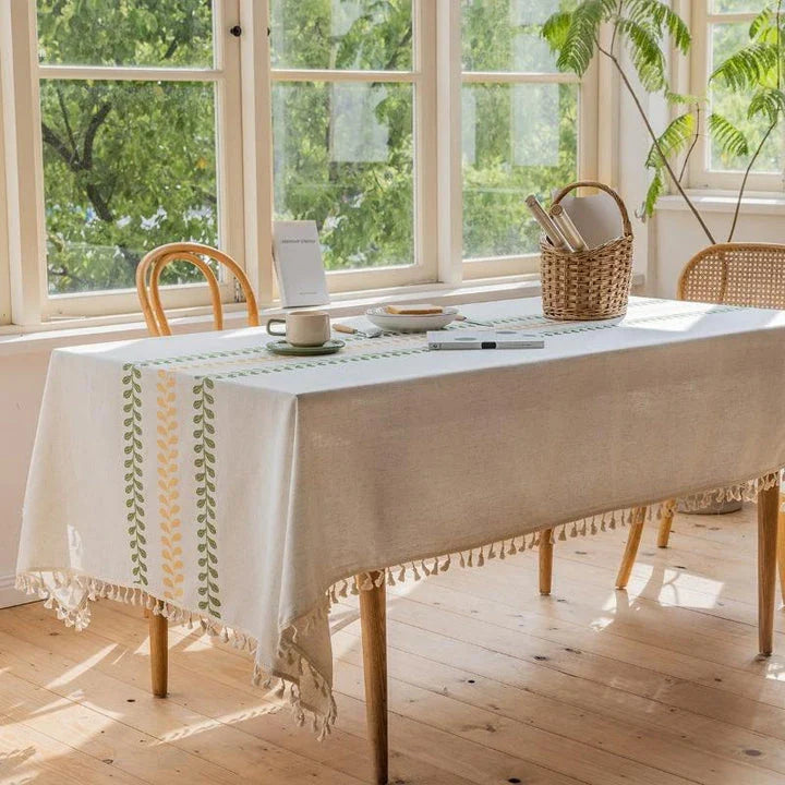 Elegant floral embroidery tablecloth in rectangular shape, featuring a delicate leaves pattern and durable polyester construction