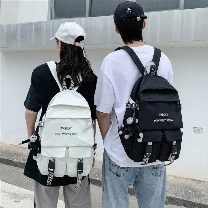 A stylish white backpack with clean lines and a modern design, perfect for college students
