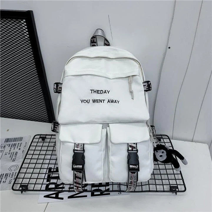A stylish white backpack with clean lines and a modern design, perfect for college students