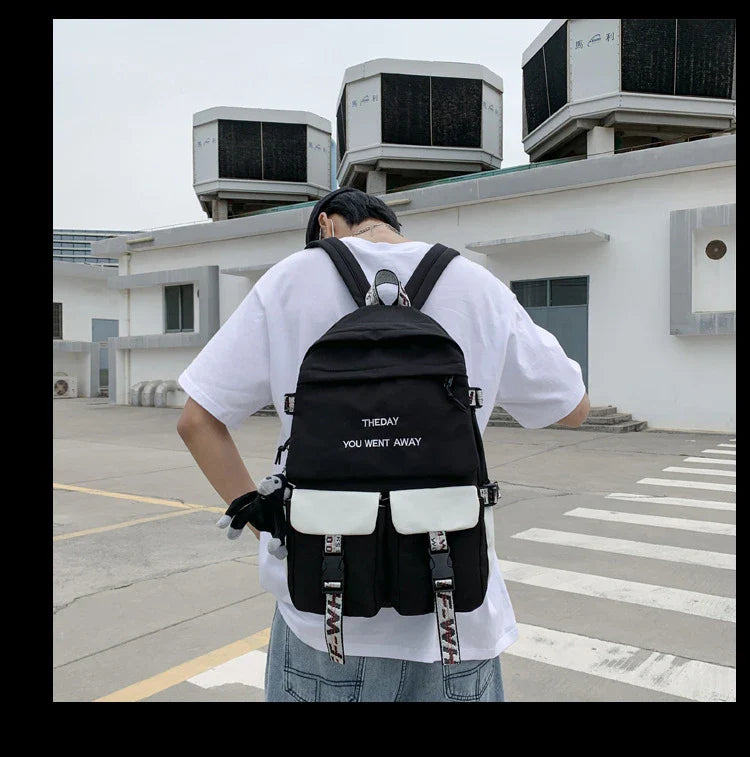 A stylish white backpack with clean lines and a modern design, perfect for college students