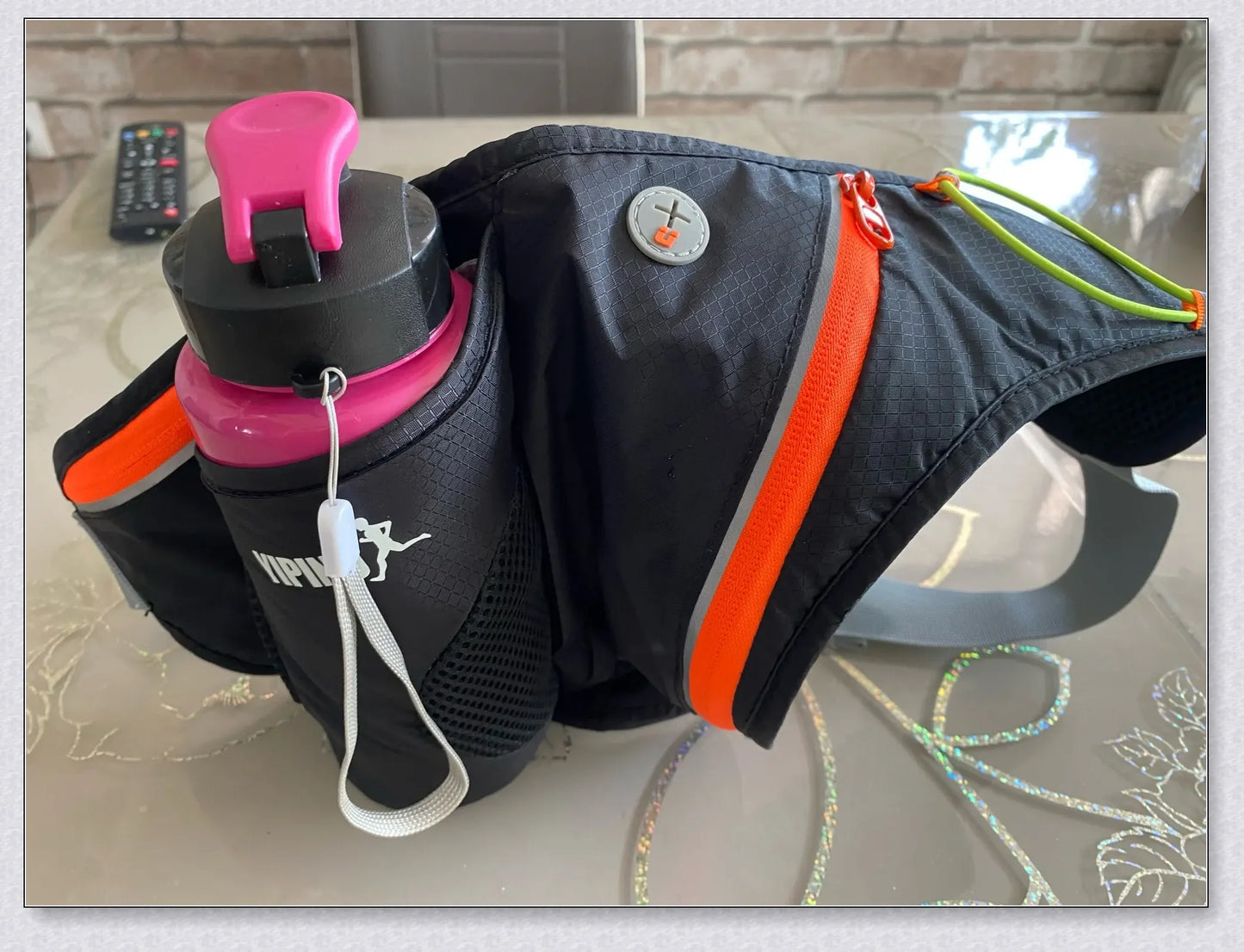 Adjustable Running Water Bottle Waist Pack with Reflective Safety Tabs and Multiple Pockets