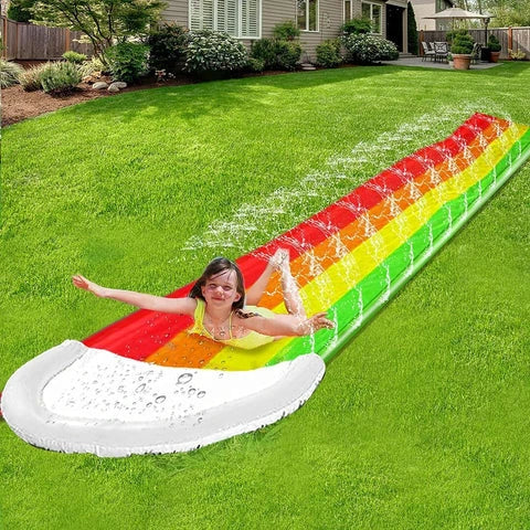 Giant water slides with zig-zag sprinkler system, perfect for summer fun and backyard adventures with kids