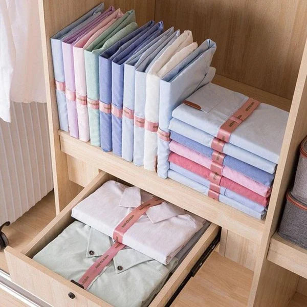 Dress Book - Space-Saving Clothes Folder Organizer with pink and gold color options, neatly organizing and storing clothes in a compact, wrinkle-free manner