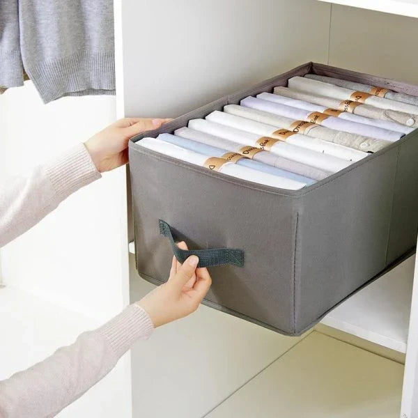 Dress Book - Space-Saving Clothes Folder Organizer with pink and gold color options, neatly organizing and storing clothes in a compact, wrinkle-free manner