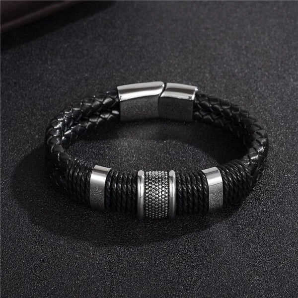A stylish black braid woven leather bracelet with titanium stainless steel accents, perfect for men's fashion and accessorizing.