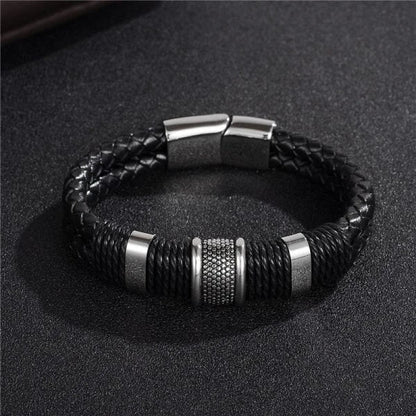 A stylish black braid woven leather bracelet with titanium stainless steel accents, perfect for men's fashion and accessorizing.