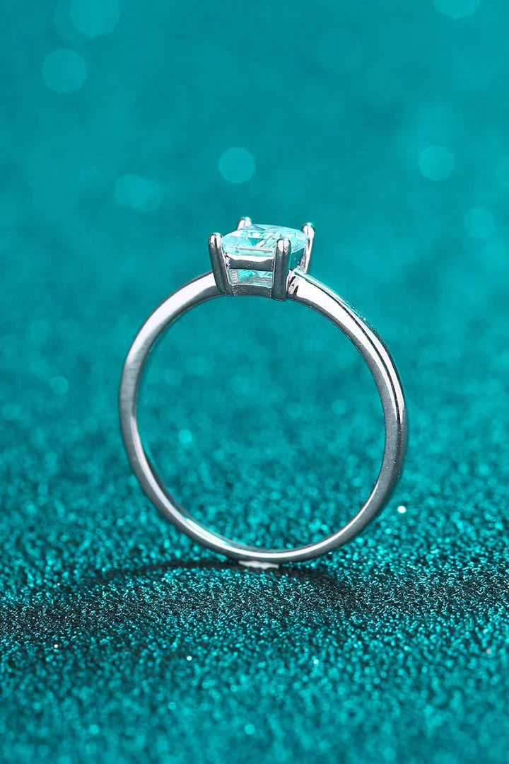 925 sterling silver ring with a mesmerizing moissanite center stone, showcasing a modern and minimalist design