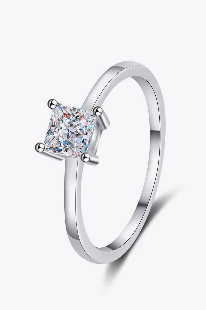 925 sterling silver ring with a mesmerizing moissanite center stone, showcasing a modern and minimalist design