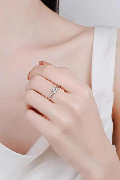 925 sterling silver ring with a mesmerizing moissanite center stone, showcasing a modern and minimalist design