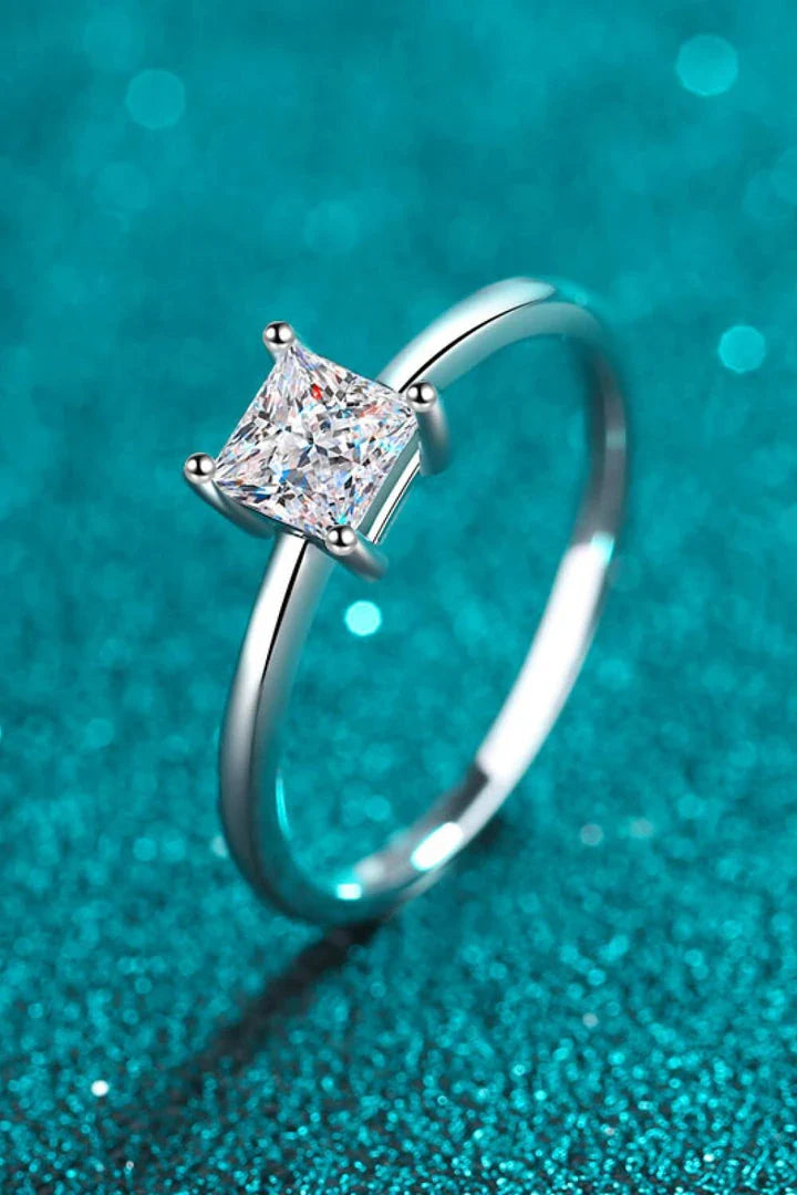 925 sterling silver ring with a mesmerizing moissanite center stone, showcasing a modern and minimalist design