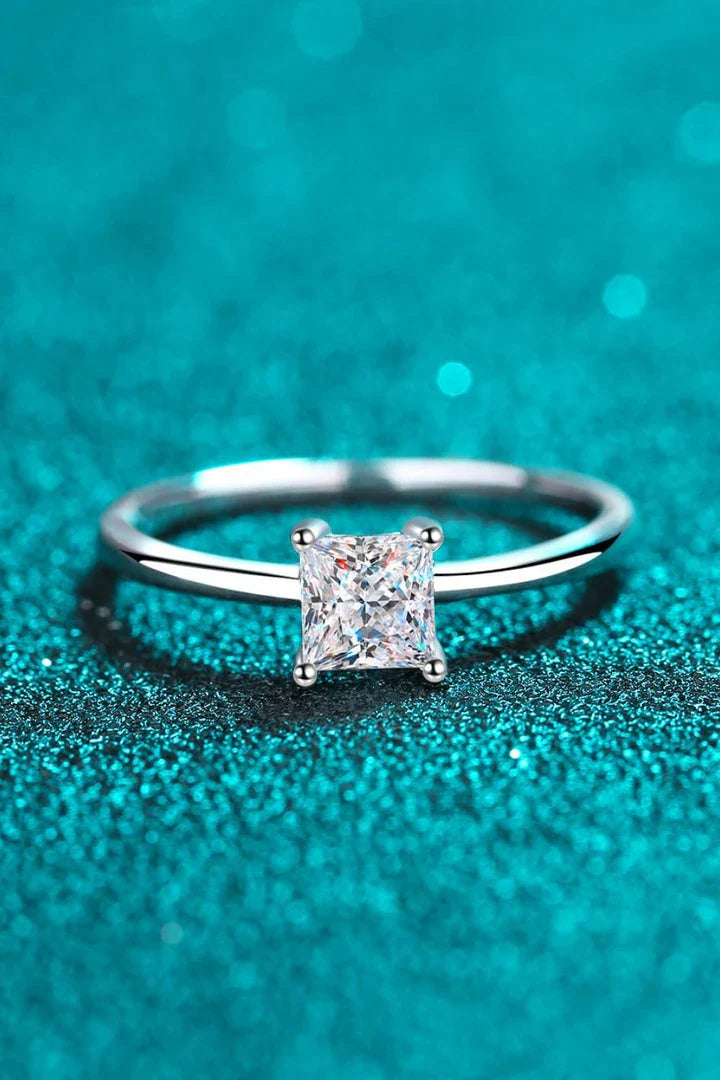 925 sterling silver ring with a mesmerizing moissanite center stone, showcasing a modern and minimalist design