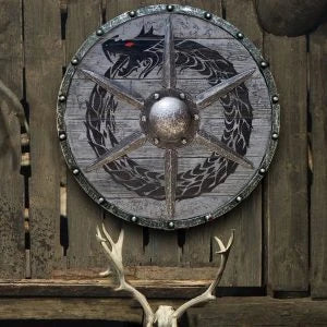 Eivor Valhalla Raven War Pattern Viking Shield - Authentic battle-worn design with striking raven motif, tooled Celtic knots, and forged iron spikes