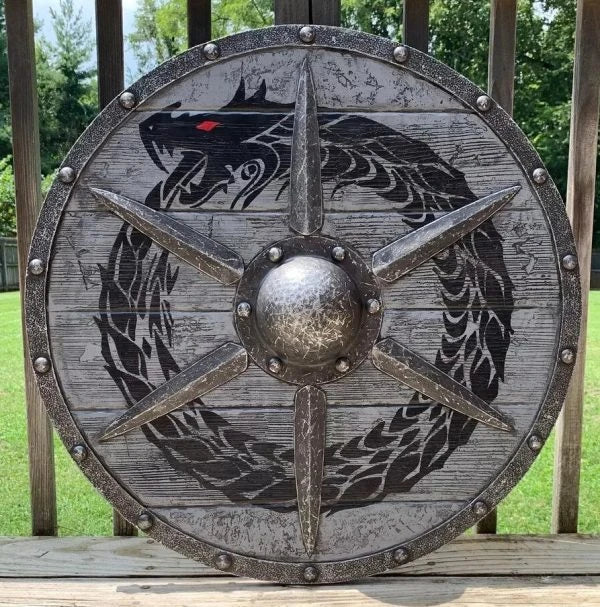 Eivor Valhalla Raven War Pattern Viking Shield - Authentic battle-worn design with striking raven motif, tooled Celtic knots, and forged iron spikes