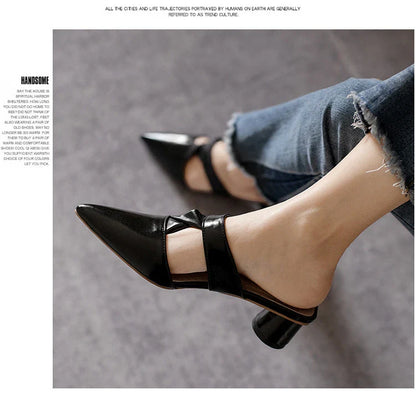 Stylish, pointed-toe sandals with a thick, red heel and PU upper for a fashionable, comfortable look.