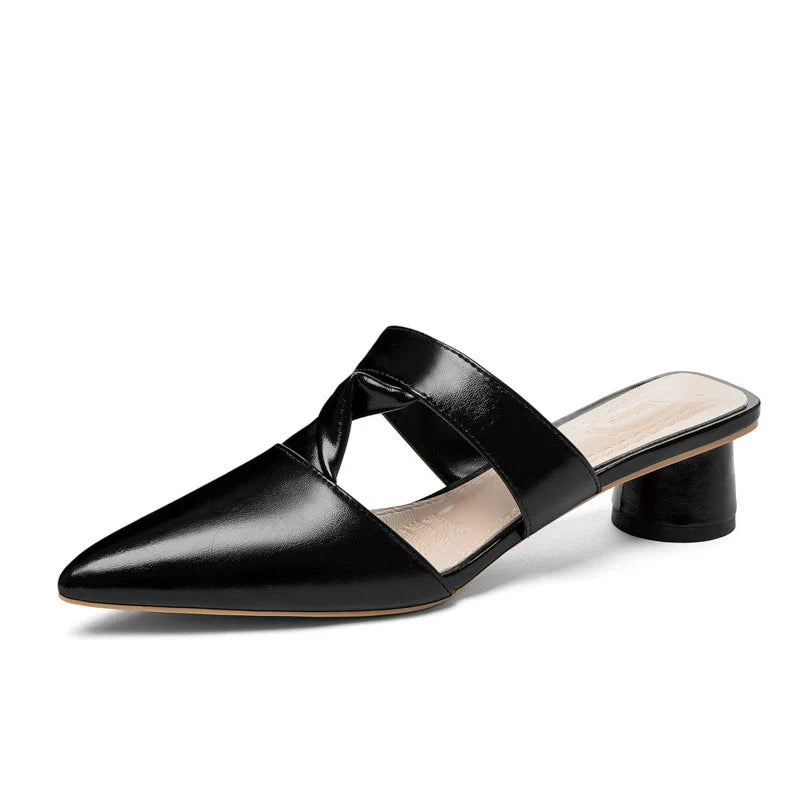 Stylish, pointed-toe sandals with a thick, red heel and PU upper for a fashionable, comfortable look.